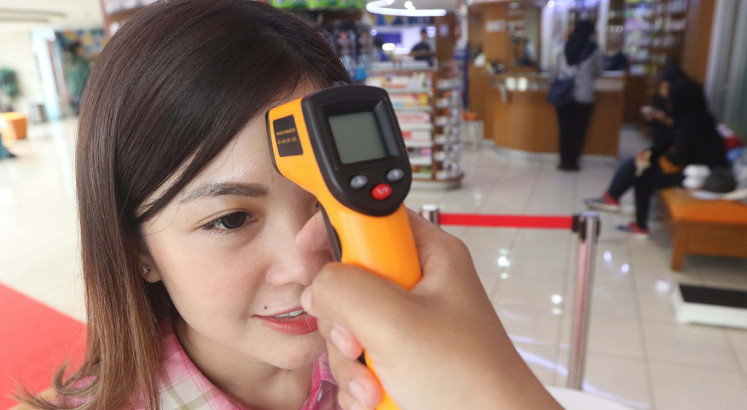 How are Indonesians reacting to the COVID-19 pandemic? 