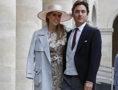 Britain's Princess Beatrice and property tycoon Edoardo Mapelli Mozzi arrive to attend the wedding of prince Napoleon and Countess Olympia Arco-Zinneberg at the Saint-Louis-des-Invalides cathedral at the Invalides memorial complex in Paris on October 19, 2019.
