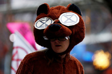 A member of Extinction Rebellion protests ahead of the 70th Berlinale International Film Festival in Berlin, Germany, on February 29, 2020. 