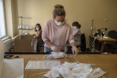 Sewing face masks goes viral in Europe