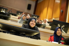Eager Learners: Students smile during an inspirational class of the Djarum Foundation-sponsored March Festival (MARFEST) 2020, held on March 12-14 at Raden Umar Said Kudus vocational senior high school (SMK) in Central Java. The festival features creatives and professionals of all backgrounds to arm the students with the skills and know-how they need to join the world of work in Industry 4.0. 
