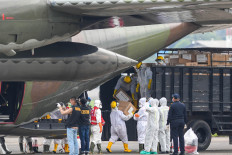 Military aircraft carrying medical equipment from China arrives in Jakarta