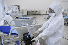 For some patients, COVID-19 treatment strains both health and finances 