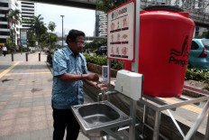 As contagion spreads, Indonesia focuses COVID-19 tests in three worst-hit provinces