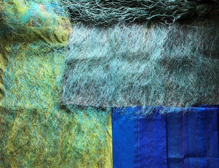 Artwork: For his work, titled 'The Ocean and The Mountain', Ari Bayuaji applies different techniques, from weaving, stitching to tying plastic threads to cotton fabric.

