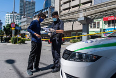 Malaysia arrests hundreds for flouting curbs on movement as virus deaths rise