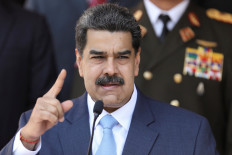 Venezuela's President Nicolas Maduro speaks during a news conference at Miraflores Palace in Caracas, Venezuela, March 12, 2020.The US government on Thursday indicted Maduro and more than a dozen other top Venezuelan officials on charges of 