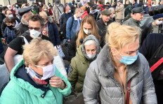 General mask use OK where hand-washing, distancing hard: WHO