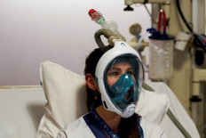  Hospitals turn to snorkel masks to ease respirator overload
