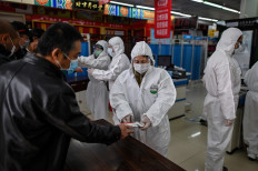 Wuhan official urges vigilance as China plans to mourn coronavirus 'martyrs'