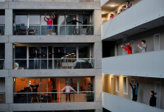 Beating lockdown inertia: French city-dwellers keep fit on balconies