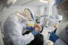 Dentists continue services via teledentistry and with tighter protocols