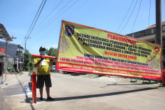 Turf war undermines COVID-19 fight in Indonesia