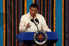 Philippine President Rodrigo Duterte gestures during his fourth State of the Nation Address at the Philippine Congress in Quezon City, Metro Manila, Philippines July 22, 2019. 