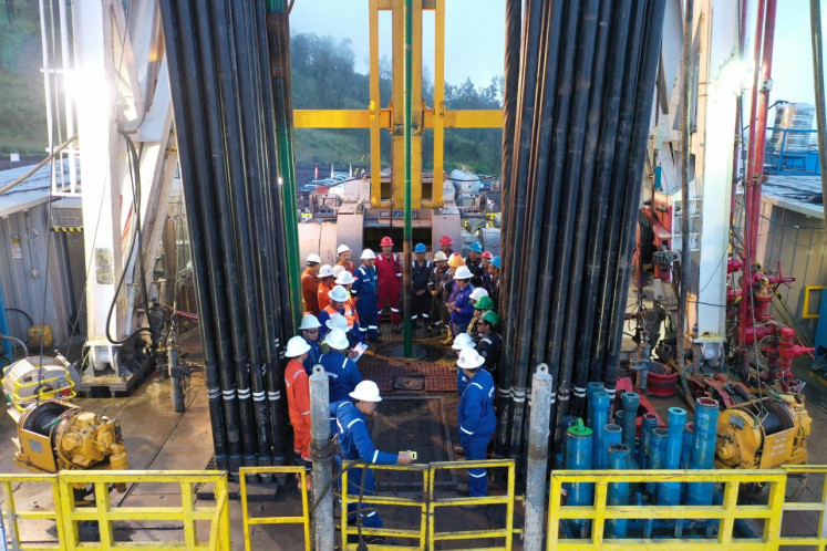 Workers oversee in April 2020 drilling of the first geothermal well for Medco Power Indonesia's 110MW plant near the Ijen volcano in East Java.