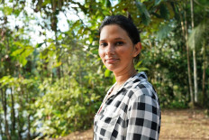 Twenty-six-year-old Maria Cunha, who lives in Sao Raimundo, municipality of Carauari, in the heart of the Brazilian Amazon Forest, poses for pictures on March 15, 2020. 
