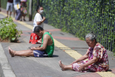 Jakarta’s poor at risk as city drags feet on COVID-19 social assistance