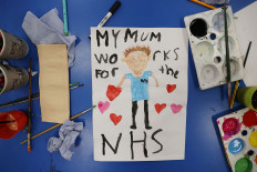 Under-fire UK govt rushes to build field hospitals as virus death toll surges