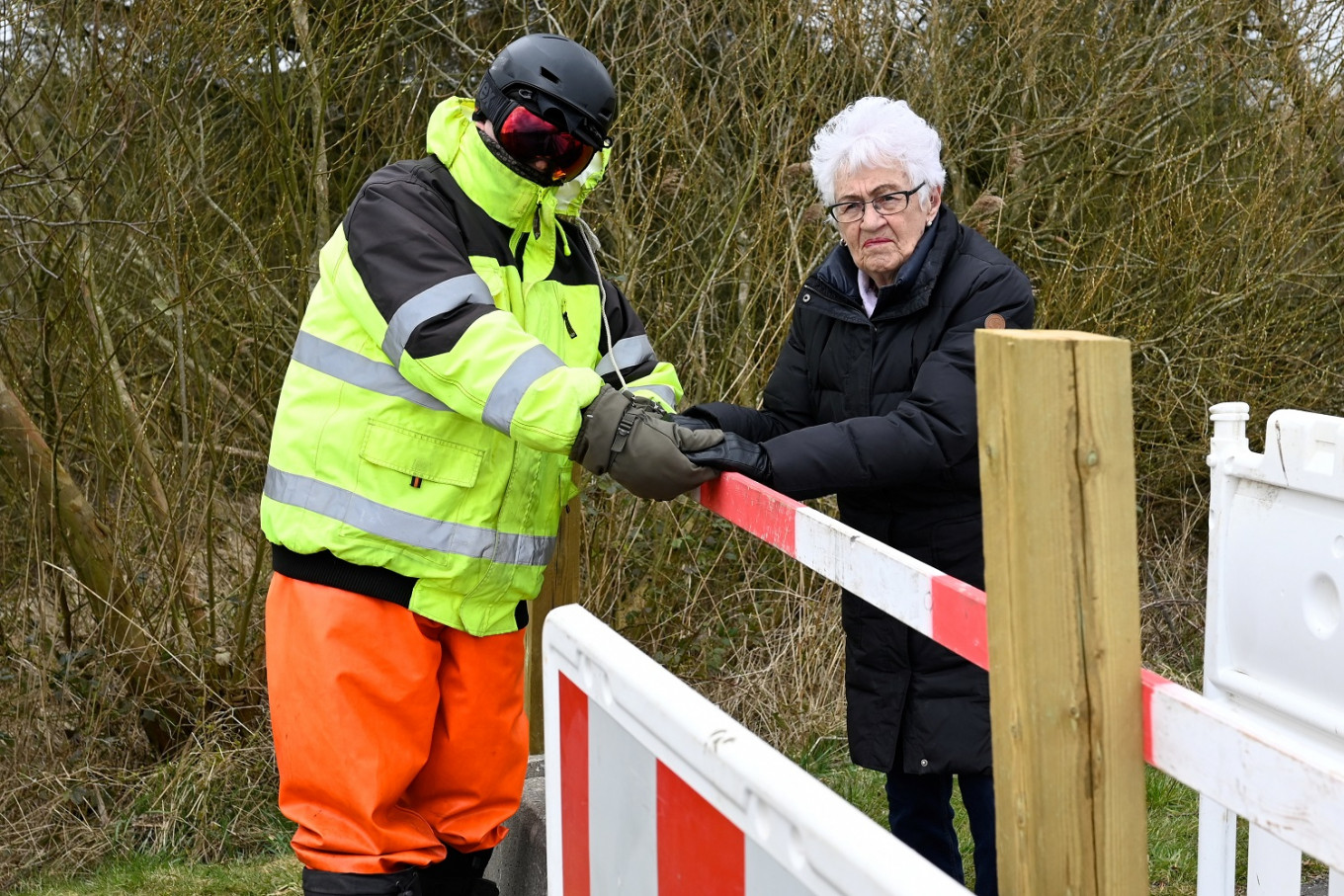 The separated couple, the eighty-nine years old German Karsten Tuchsen Hansen from Suederluegum and his eighty-five years Danish girlfriend Inga Rasmussen from Gallehus meet daily at the Aventoft border crossing after the border has been closed, as the spread of the coronavirus disease (COVID-19) continues in Aventoft, Germany, on April 2, 2020.