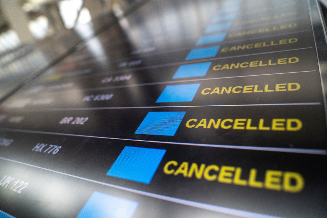 Arrival flight boards shows canceled flights as Thailand will temporarily ban all passenger flights from landing in the country to curb the outbreak of the coronavirus disease (COVID-19), at Bangkok's Suvarnabhumi International airport, Thailand, April 4, 2020.Thailand on Monday extended a grace period for visa renewals for foreigners stranded in the country due to the coronavirus pandemic until the end of October, as travel restrictions remain in place and new infections climb globally.