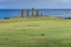 View of Moais -- stone statues of the Rapa Nui culture -- in Easter Island, 3700 kilometers off the Chilean coast in the Pacific Ocean, on March 31, 2020. 