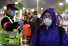 China's Wuhan lockdown ends, but another begins as local coronavirus cases rise