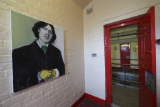 A portrait of former inmate Oscar Wilde, who was gaoled for gross indecency with another man, is displayed in a cell at the former Reading prison, in Reading, Britain, on September 1, 2016. 