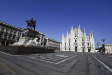A general view shows a deserted Piazza del Duomo in central Milan, Italy, on April 9, during the country's lockdown aimed at curbing the spread of the COVID-19 infection. Italy, a Schengen state, is among the countries worst-hit by the pandemic.
