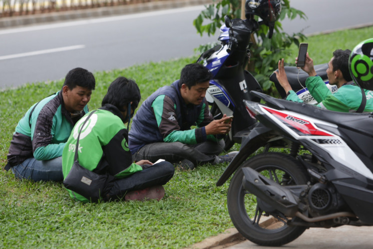COVID-19: Jakarta's partial lockdown deals a heavy blow to 'ojek' drivers 
