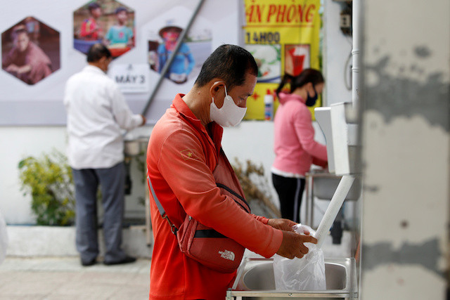 Rice ATM' feeds Vietnam's poor amid virus lockdown - SE Asia - The ...