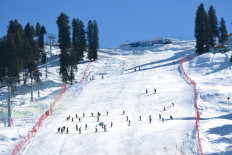 In this picture taken on February 9, 2020, skiers take part in the closing ceremony of the Malam Jabba International Alpine Ski Cup 2020 in the winter sports resort Malam Jabba, a ski resort in the Hindu Kush range of the Swat Valley in Khyber Pakhtunkhwa province.