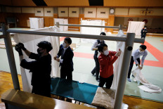 Japan's homeless 'net cafe refugees' seek shelter amid virus woe