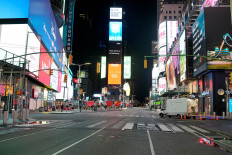 Times Square stands relatively empty of pedestrians and traffic as the outbreak of the coronavirus disease (COVID-19) continues in the Manhattan borough of New York, U.S., April 14, 2020. 