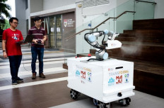 Singapore disinfecting robot trialed in virus fight