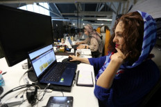 Women in virus-hit Iran tech sector fight to keep hard-won jobs
