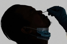 WHO clarifies COVID-19 'very rare' transmission remarks