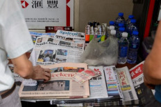 South China Morning Post cuts management pay, puts staff on unpaid leave