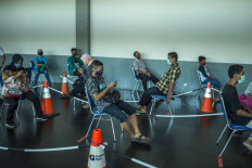 Police lock up 171 people for violating curfew during PSBB in Greater Surabaya