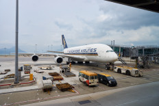 Airbus A380 of Singapore Airlines docked in Hong Kong Airport. 