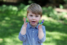 Undated handout photo released by Kensington Palace of Prince Louis, who celebrates his second birthday on Thursday, taken by his mother, the Duchess of Cambridge, in Britain. 