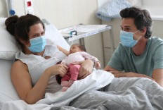 Mothering with a mask: Belgian with COVID-19 gives birth to healthy baby