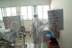 Thailand's coronavirus medics feel strain even as cases decline