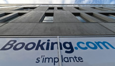 This picture shows the logo of the new Dutch company Booking.com's customers attention service in Tourcoing, northern France, on Oct. 4, 2019.The travel reservation company Booking.com, a unit of Booking Holdings Inc, deserves to be able to trademark its name, the US Supreme Court decided on Tuesday, overruling a federal agency that found it too generic to merit protection.