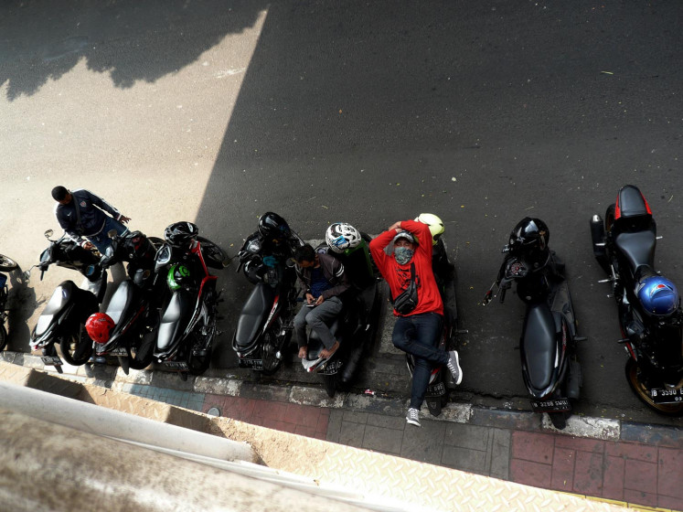 Surviving the streets of virus-stricken Jakarta