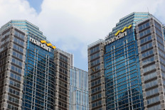 Positive outlook :State-owned Bank Mandiri  is helping businesses facechallenging times with online banking solutions.
