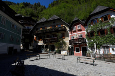 Empty benches are seen during the coronavirus disease (COVID-19) outbreak on the main square of the city of Hallstatt, Austria, on April 22, 2020.