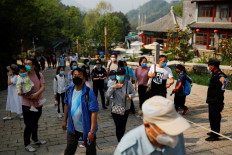 Tourists visit the Mutianyu section of the Great Wall of China on the first day of the five-day Labor Day holiday following the coronavirus disease (COVID-19) outbreak, on the outskirts of Beijing, China, on May 1, 2020. 