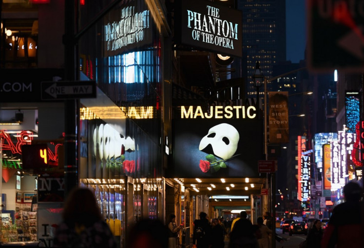 In this file photo taken on March 12, 2020 signage of the Broadway play 