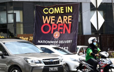 Malaysia to reopen most economic activity with virus outbreak 'under control'