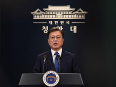South Korea's Moon hints at dog meat ban amid debate over animal rights